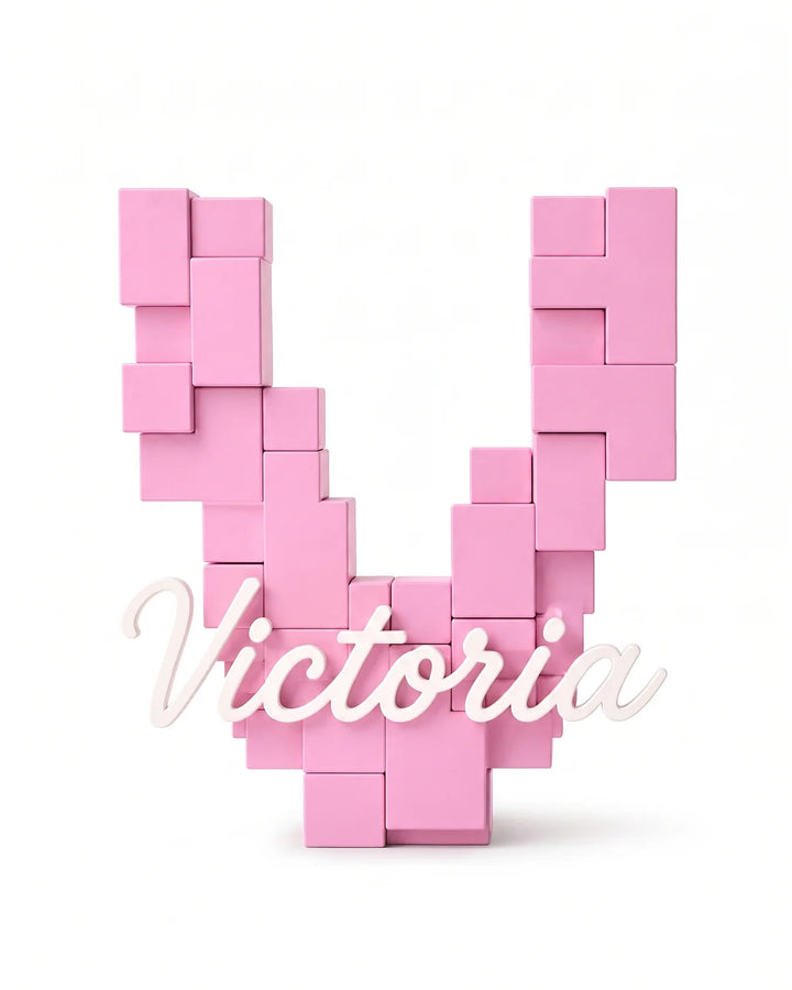 Letra V personalizada 3D de bloques pixel en rosa con el nombre Victoria en caligrafía